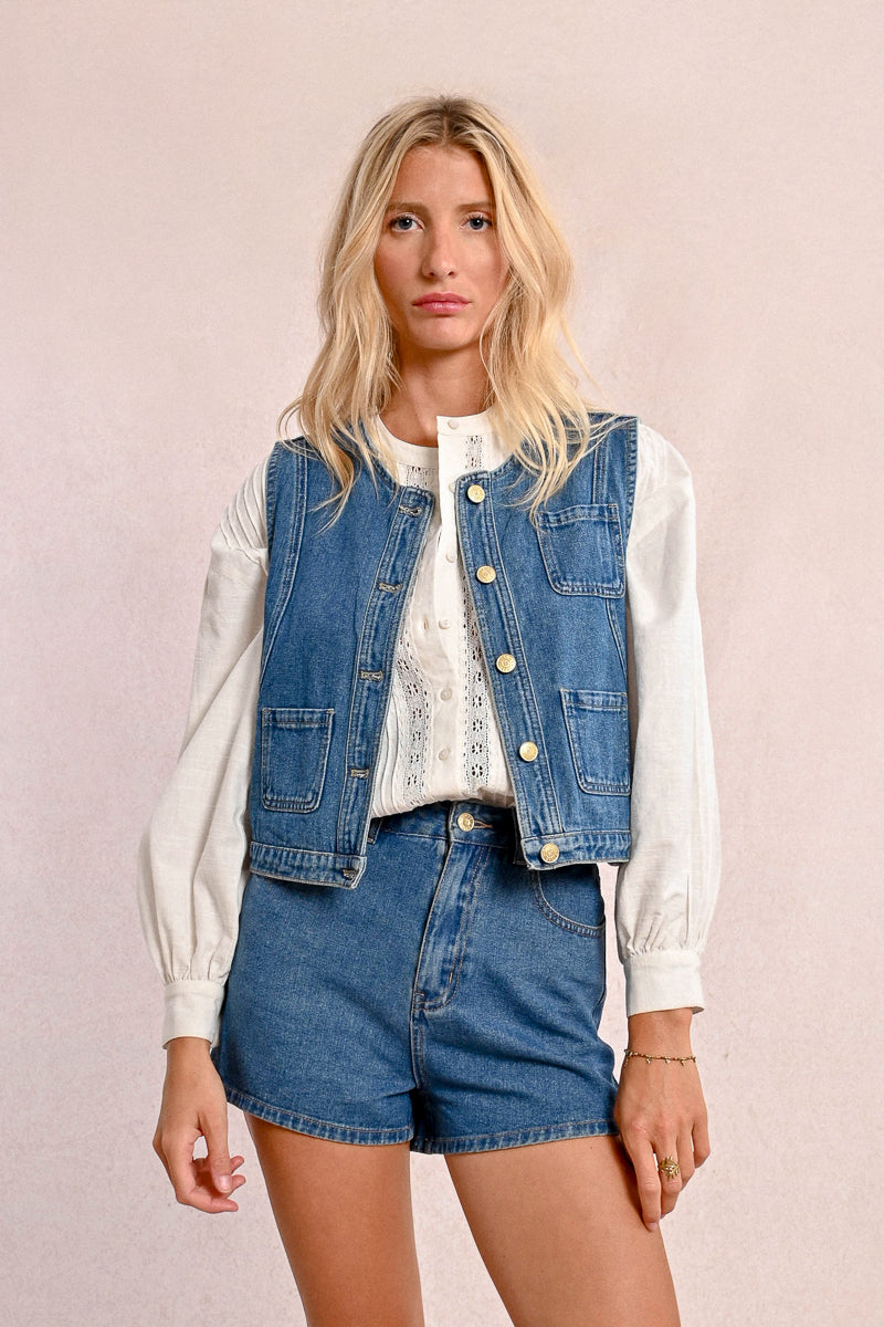 MOLLY RBACKEN - Denim Vest
vest, denim, blue denim, denim vest, blue denim vest, button up vest, jean vest, blue jean, blue jean vest, button up, sleeveless, sleeveless denim